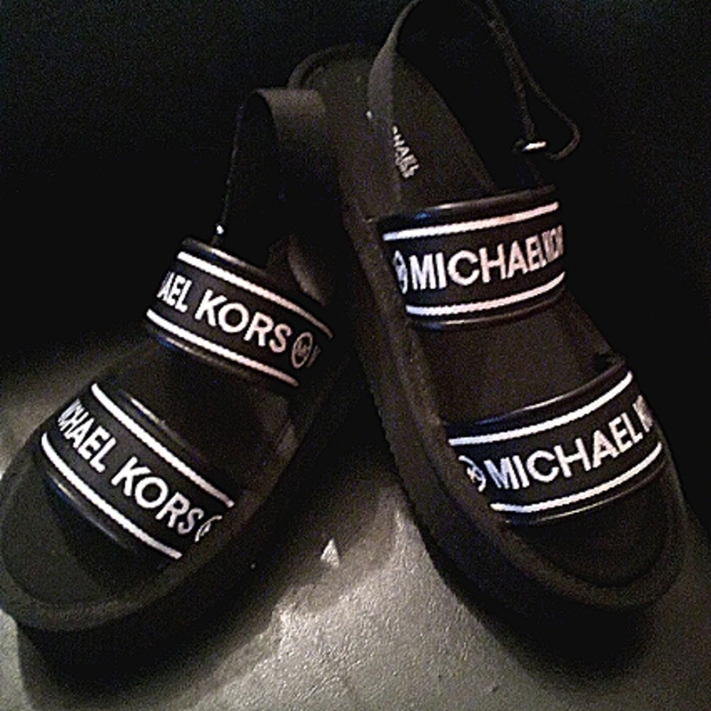 Black and white strapped Michael Kors sandals size 8